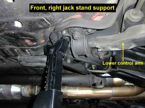 Jack stand under frame member, front